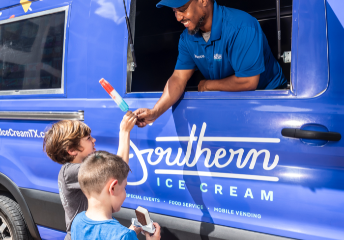 kids getting ice cream from the ice cream truck